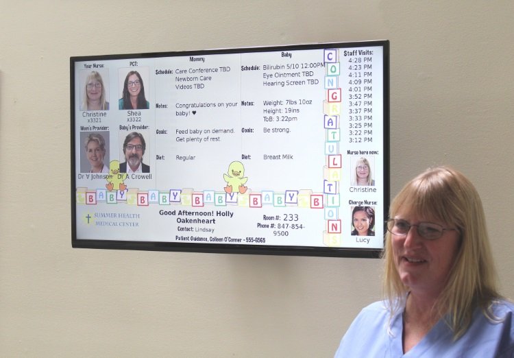Electronic Patient Room Whiteboard with picture of current Nurse here now